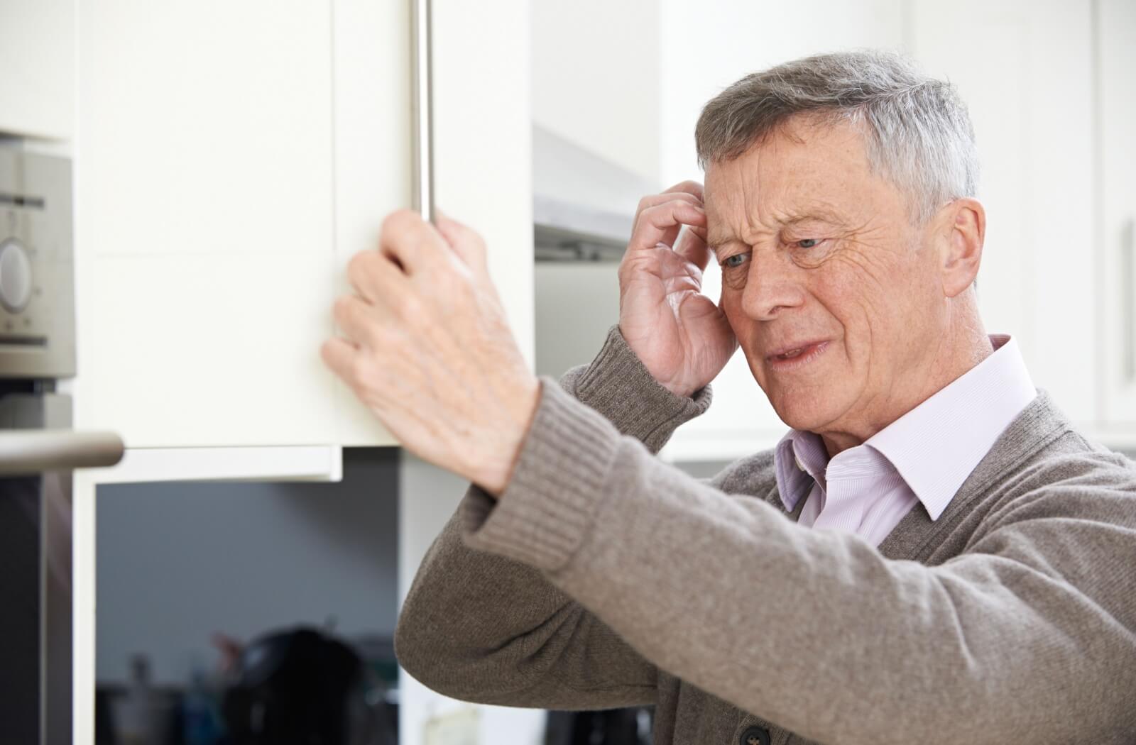 A senior struggling with forgetfulness due to dementia